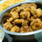 fried food on white ceramic bowl