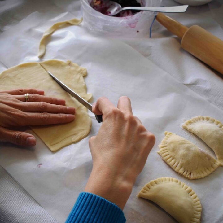 person making Empanadas