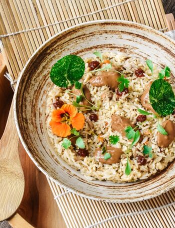 brown wooden bowl with food
