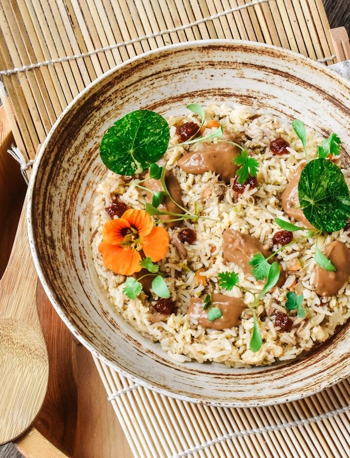brown wooden bowl with food