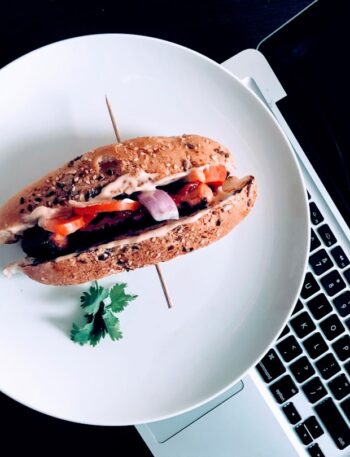 round white plate with burger