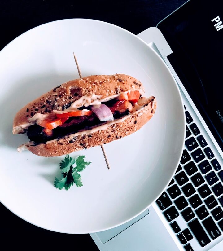 round white plate with burger