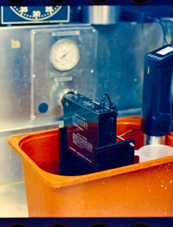Sous vide machine in orange container