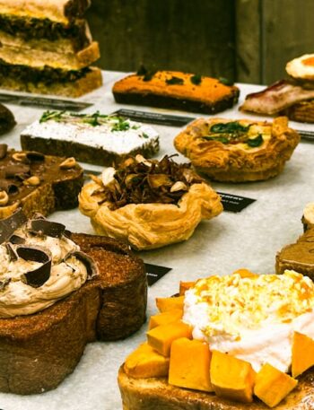 Delicious pastries are on display at a bakery.